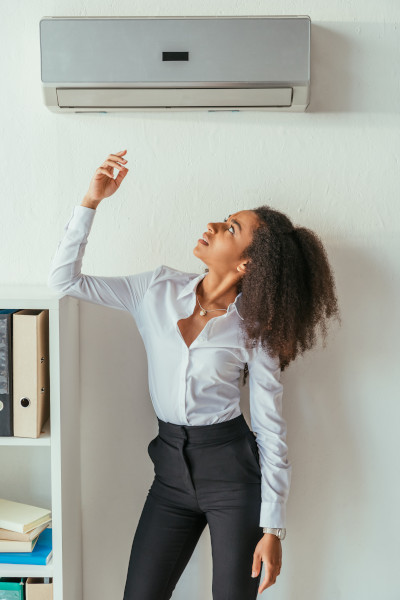 woman enjoying cooling equipment