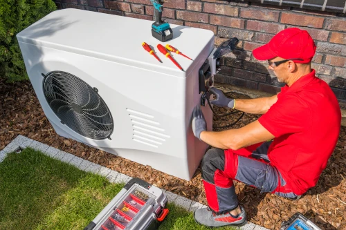 technician-repairing-heat-pump-unit